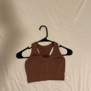 It's a dark pink sport bra size small